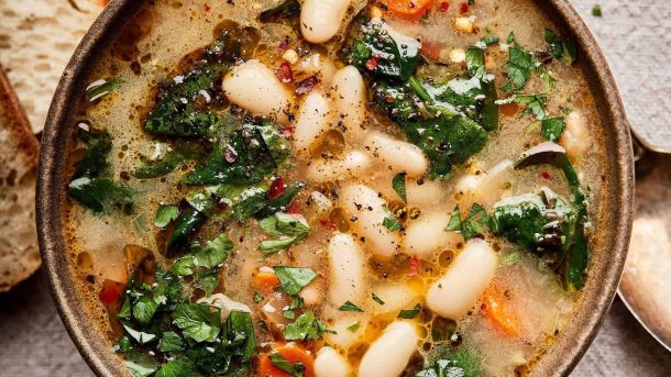 This Tuscan white bean and kale soup is Pinterest's most-saved vegan soup recipe. One pot, 35 minutes, deeply nourishing and Italian-inspired. The best easy vegan dinner for cold nights.